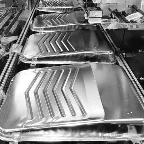 Metal paint trays made of transfer die stamped metal